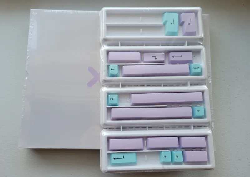 GMK Muted 2 with Cyan and Purple Accents