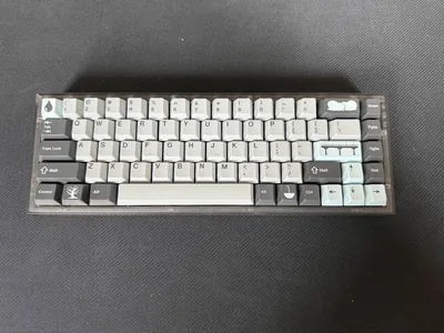 NovelKeys NK65 EE keyboard with Osume switches and GMK Rainy Day keycaps